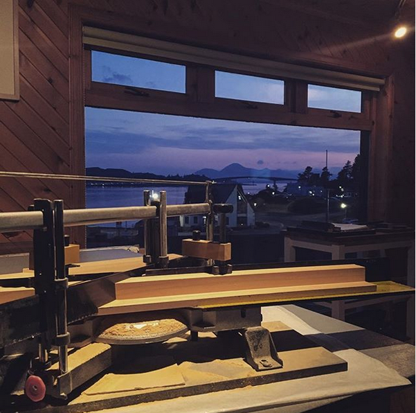 Picture framing in progress with sunset